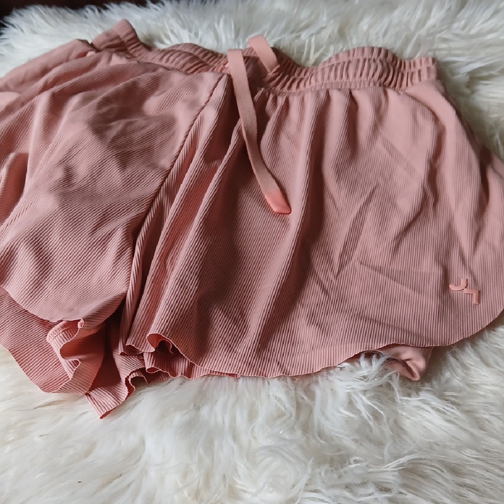 Pink Athletic Shorts with Elastic Waistband and Lightweight Fabric